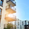 A contemporary residential building exterior during daylight