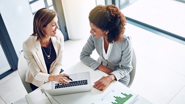 Laptop, meeting and women in office together for research ideas